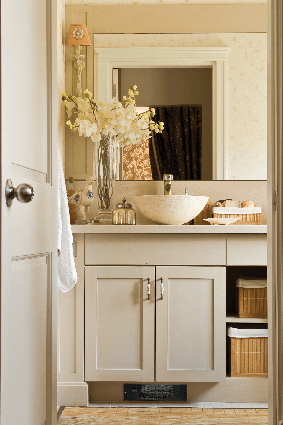 Twin Flo discreetly placed under a bathroom cabinet to keep the space warm