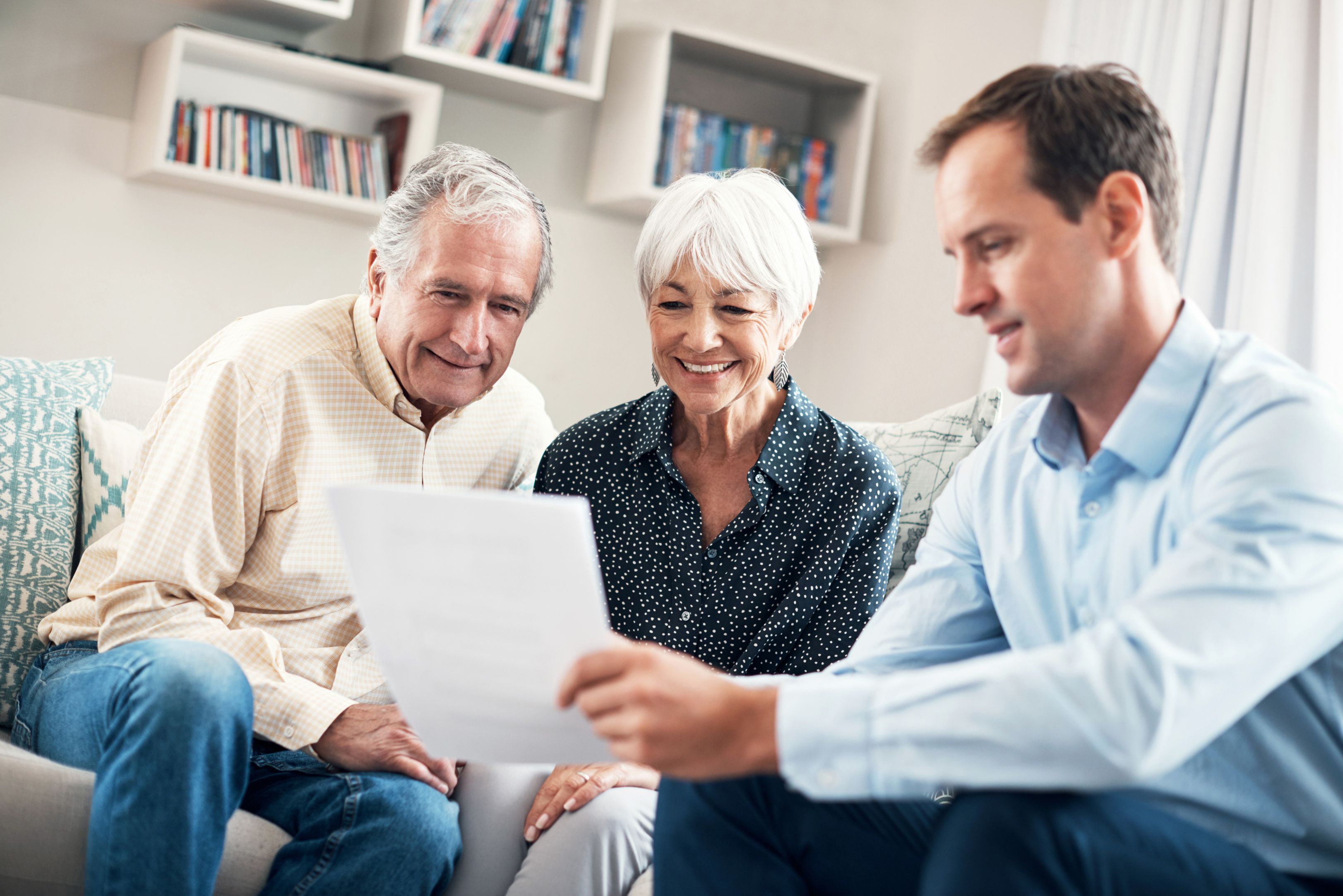 Beacon Morris representative talking to a couple in their home